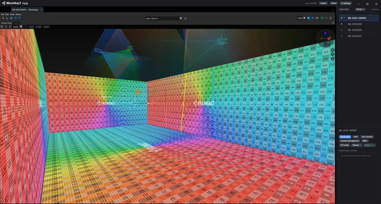 An immersive room in the Backstage Scene View: three walls and the floor set up as projection surfaces, each carrying a colour test grid, with projector frusta crossing above them.